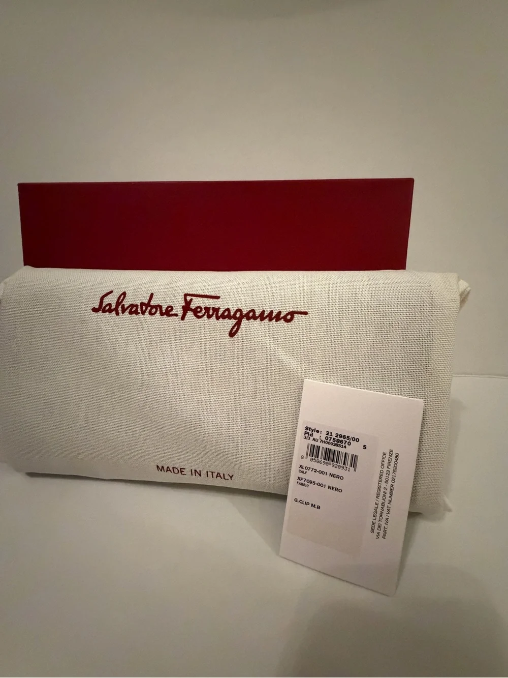 Salvatore Ferragamo Black Leather Clutch with Gold Gancini Bar